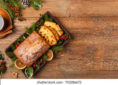 Christmas Cake. Fruitcake. Natural Wooden Background. Top View.