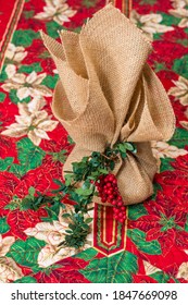 Christmas Cake Gift Wrapped On Christmas Table Runner