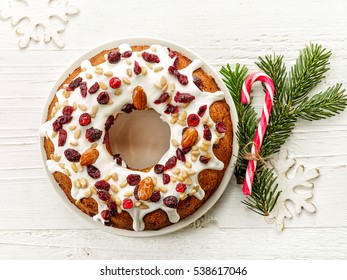 Christmas Cake On White Wooden Table, Top View