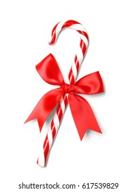 Christmas Candy Cane With Bow Isolated On White