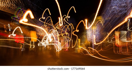 Christmas & Car Lights Blurred By Long Exposure.  Gatlinburg, TN, USA.