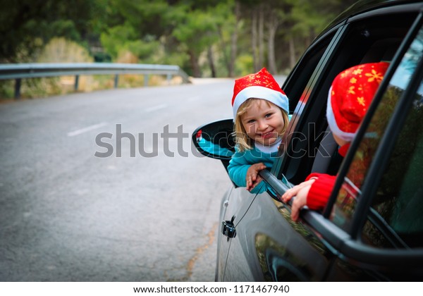 christmas car\
travel- happy kids travel in\
winter