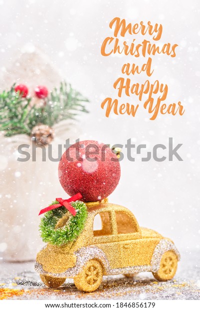 Christmas card with decorated gold car,\
Christmas ball on light background. Festive\
concept