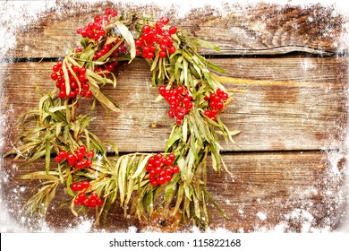 Christmas Card Design Featuring A Home Made Christmas Wreath With Natural Decorations Hanging On A Rustic Wooden Wall /holidays Background