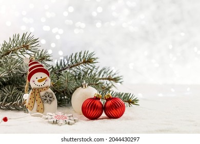Christmas card with fir branches and Christmas decorations. Copy space. 
