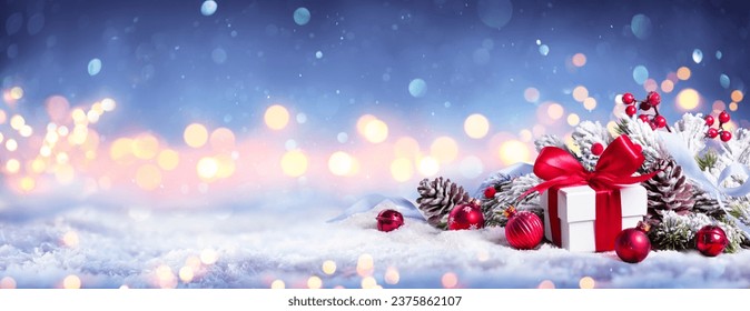 Christmas Card - Gift On Snow - Blue Snowing With Bokeh Lights And Ornament In Fir Branch - Abstract Defocused Background - Powered by Shutterstock