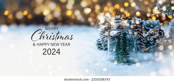 Christmas Card - Merry Christmas and Happy New Year 2024 - Christmas tree in snow and magic bokeh lights - winter background banner, header, xmas greetings	
 - Powered by Shutterstock