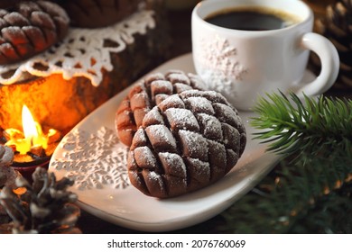 Christmas chocolate pine cone shortbread cookie and cup of coffee, powdered sugar dressing, New Year's decoration. Rustic style - Powered by Shutterstock