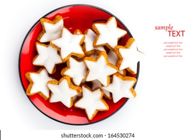 Christmas Cinnamon Star Cookies On Red Plate