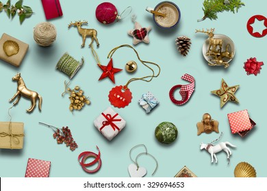 Christmas collection, gifts and decorative ornaments, on blue background. photographic montage - Powered by Shutterstock