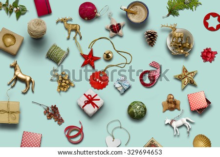 Christmas collection, gifts and decorative ornaments, on blue background. photographic montage