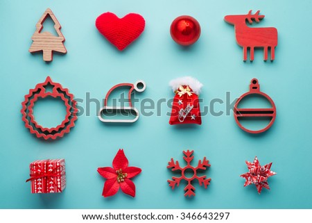 Christmas collection, gifts and decorative ornaments, on blue background. photographic montage. View from above
