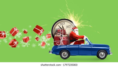 Christmas is coming. Santa Claus on toy car delivering New Year 2021 gifts and countdown clock at green background with fireworks