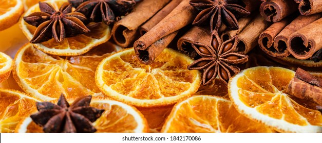 Christmas composition : Beautiful top view flat lay arrangement of dry Oranges cinnamon sticks and star anise - Powered by Shutterstock