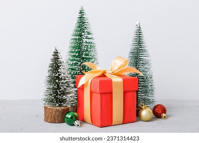 Christmas composition. craft Gift box, small tree, branches and craft DIY decorations on white background. New year concept. Christmas home decoration Flat lay, top view, copy space. - Powered by Shutterstock