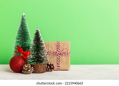 Christmas Composition. Gifts, Small Tree, Branches And Craft DIY Decorations On White Background. New Year Concept. Christmas Home Decoration Flat Lay, Top View, Copy Space.