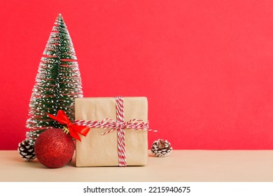 Christmas Composition. Gifts, Small Tree, Branches And Craft DIY Decorations On White Background. New Year Concept. Christmas Home Decoration Flat Lay, Top View, Copy Space.