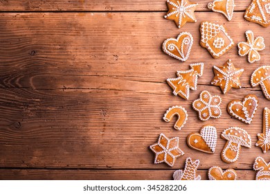 Christmas composition with gingerbreads. Studio shot on wooden background. - Powered by Shutterstock