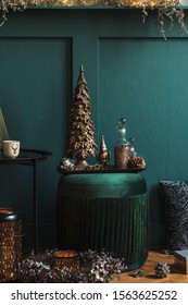 Christmas Composition On The Green Velvet Pouf In Living Room. Beautiful Decoration. Christmas Trees, Candles, Stars, Lights And Elegant Accessories. Merry Christmas And Happy Holidays, Template. 