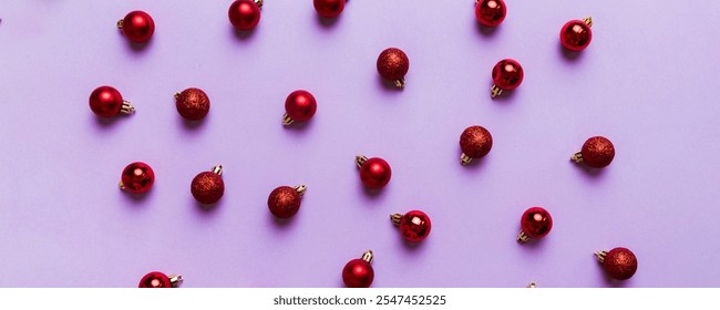 Christmas composition. a pattern of christmas balls on colored background. Flat lay, top view New year decor.