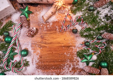 Christmas Composition With Spruce Branch And Gifts.  Wood Table . Top Down