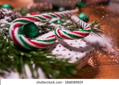 Christmas Composition With Spruce Branch And Gifts.  Wood Table . Top Down