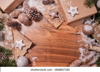 Christmas Composition With Spruce Branch And Gifts.  Wood Table . Top Down