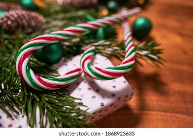 Christmas Composition With Spruce Branch And Gifts.  Wood Table . Top Down