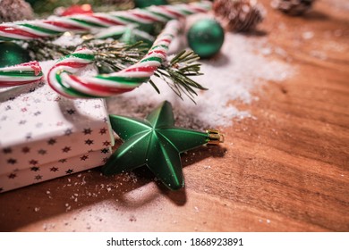 Christmas Composition With Spruce Branch And Gifts.  Wood Table . Top Down