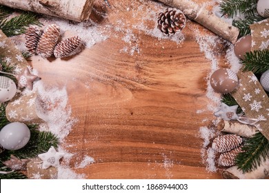 Christmas Composition With Spruce Branch And Gifts.  Wood Table . Top Down