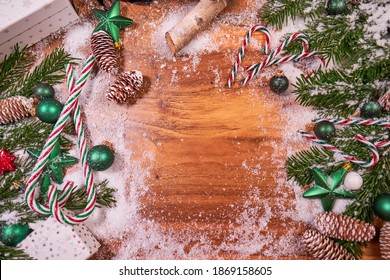 Christmas Composition With Spruce Branch And Gifts.  Wood Table . Top Down