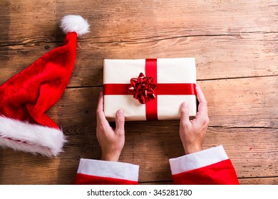 Christmas composition. Studio shot on wooden background. - Powered by Shutterstock