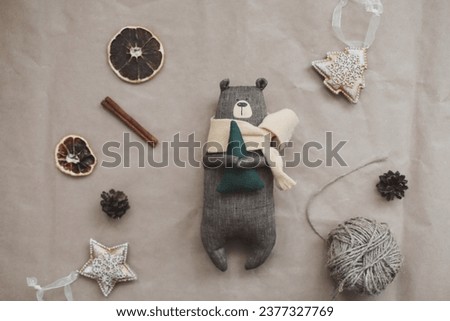 Christmas composition. Toy bear and decorations. Christmas, winter, new year concept. Flat lay, top view, copy space