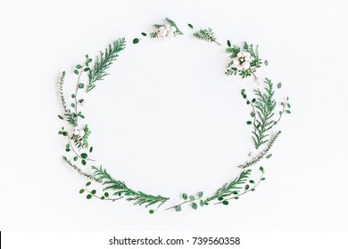 Christmas Composition. Wreath Made Of Winter Plants, Flowers, Berries On White Background. Christmas, Winter, New Year Concept. Flat Lay, Top View, Copy Space