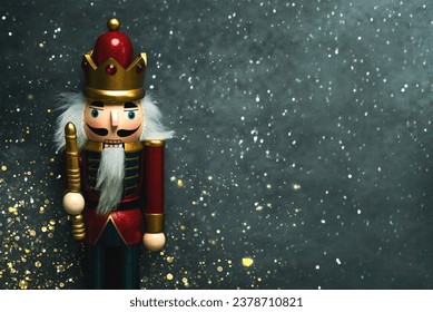 Christmas concept background. Top view of Christmas wooden nutcracker toy solider with space for text and christmas lights