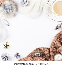 Christmas Concept Flat Lay. Warm, Cozy Winter Clothing, Hot Drink And Christmas Decorations Frame On White Background