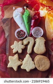 Christmas Cookie Decorating Kit With Red, Green And White Icing, Sprinkles And Cookies In The Shapes Of Snowflakes, Candy Canes, Snowmen, Stars, Christmas Trees And Ornaments 