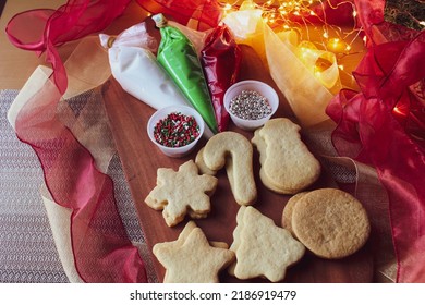 Christmas Cookie Decorating Kit With Red, Green And White Icing, Sprinkles And Cookies In The Shapes Of Snowflakes, Candy Canes, Snowmen, Stars, Christmas Trees And Ornaments 