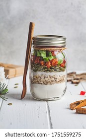 Christmas Cookie Mix Jar. Dry Ingredients For Making Christmas Cookies In A Jar, White Background.