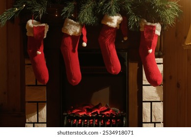 Christmas cozy home interior. Christmas stockings hanging over fireplace.  - Powered by Shutterstock