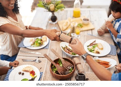 Christmas, cracker and family at lunch in home with health, wellness and diet meal for bonding. Celebration, festive and group of people with surprise paper tube for xmas brunch together in backyard. - Powered by Shutterstock