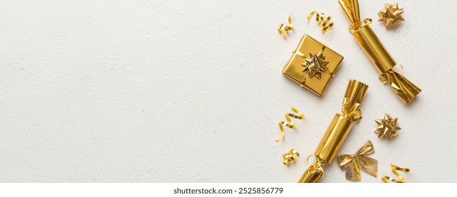 Christmas crackers with shiny confetti on color background, top view, copy space. - Powered by Shutterstock