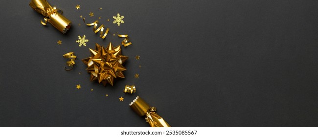 Christmas crackers with shiny confetti on color background, top view, copy space. - Powered by Shutterstock