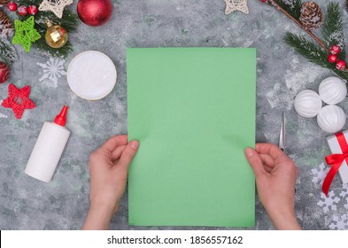 Christmas craft - paper tree, step by step instructions. Step 2- take a sheet of green paper