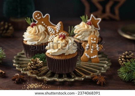 Christmas  cupcakes with gingerbread  cookies, Festive Christmas and New Year baking idea for holiday dinner