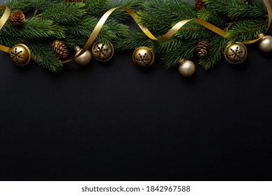 Christmas Deco With Fir And Baubles On Dark Background. Flat Lay. Christmas Concept 