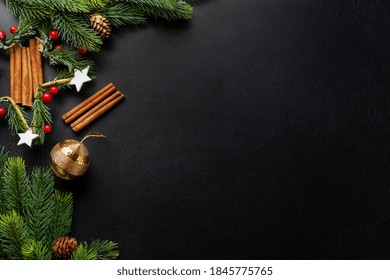 Christmas Deco With Fir And Baubles On Dark Background. Flat Lay. Christmas Concept 