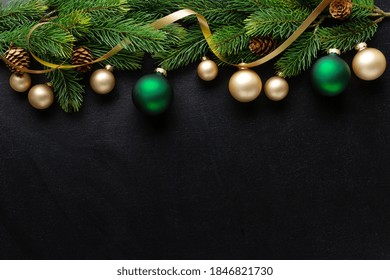 Christmas Deco With Fir And Baubles On Dark Background. Flat Lay. Christmas Concept 