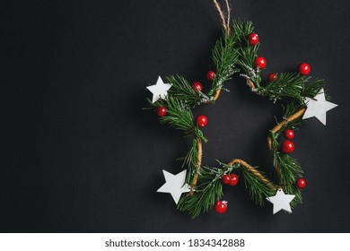 Christmas Deco Star Wreath On Dark Background. Flat Lay. Christmas Concept 