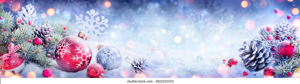 Christmas Decoration Banner - Snowy Ornament With Pinecones On Fir Branch And Defocused Lights
